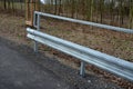 Path for cyclists with an asphalt surface. galvanized iron railing over road barriers. Bridge railing with tilting to the sides. r Royalty Free Stock Photo