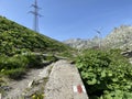 The Path of Energy der Pfad der Energie in the Gotthard wind farm or Windpark St. Gotthard and in the alpine mountainous Royalty Free Stock Photo