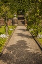 Path through formal garden to steps at Biddulph Grange