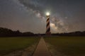 Path leading to Cape Hatteras Light and The Milky Way Galaxy. Royalty Free Stock Photo