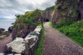 Path leading to the Cushendun Cave in Northern Ireland