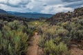 A long way home as the storm begins to set in at the Rio Grande Gorge Royalty Free Stock Photo