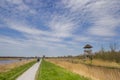 Path and lookout tower ih the nature area Alde Feanen in Eernewoude Royalty Free Stock Photo