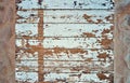 Path made of wooden boards between the beach sand. Summer background with copy space as a top view Royalty Free Stock Photo