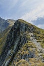 Path on the mountain ridge leading to summit. Royalty Free Stock Photo