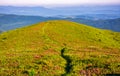 Path through the mountain ridge in summer Royalty Free Stock Photo