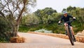 Path, nature and a man with a bike for cycling, fitness training and race. Exercise, active and a professional cyclist