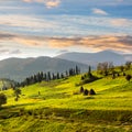 Path near field with haystacks at sunrise Royalty Free Stock Photo