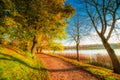 Path near lake in fall season Royalty Free Stock Photo