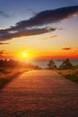 Path near the sea at sunset Royalty Free Stock Photo