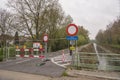 Path next to the river Zenne in Zemst, blocked by metal fences, straffic signs to prevent usage after a fatal accident