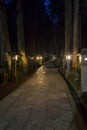 A path through the Okunoin at night in ancient Buddhist cemetery Royalty Free Stock Photo