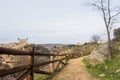 A path over the hill vith a view to Toledo Alcazar, evening at surroundings of Toledo