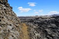 The path on the remnants of the last volcanic eruptions between the year of 1975 and 1984 at Krafla Lava Field near Myvatn, Royalty Free Stock Photo