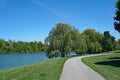 Path beside a river with willow trees