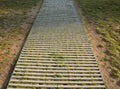 Grass grate pavement made of prefabricated concrete for greening of car park entrances and other places where there is a lot of pe Royalty Free Stock Photo