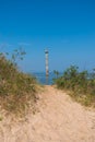 Path through the sandy dunes to the abandoned skew Kiipsaare lighthouse in Baltic sea, Estonia Royalty Free Stock Photo