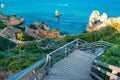 Path and stairs going down in park, way to beach in Algarve Portugal