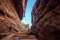 Path through steep cliffs, Entrance for lower and upper Shivalaya in Badami, Karnataka, INDIA Royalty Free Stock Photo