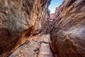 Path through steep cliffs, Entrance for lower and upper Shivalaya in Badami, Karnataka, INDIA Royalty Free Stock Photo