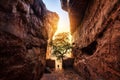 Path through steep cliffs, Entrance for lower and upper Shivalaya in Badami, Karnataka, INDIA Royalty Free Stock Photo