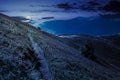 Path though mountain hills and ridge at night