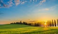 Path to hill house through cypress trees and sunrise view of stunning rural landscape of Tuscany, Italy Royalty Free Stock Photo