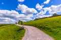 Tourists on the path to Malham Cove Yorkshire Dales National Park Tourist Attraction, England, UK Royalty Free Stock Photo