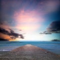 Path to nice sea beach in sunset sunshine with beautiful sky Royalty Free Stock Photo