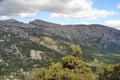 The path to the nuragic village of Monte Tiscali, view of Supramonte of Oliena