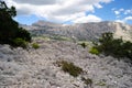 The path to the nuragic village of Monte Tiscali, view of Supramonte of Oliena and monte UddÃ¨