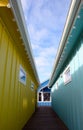 Path to a toyshop between colorful walls