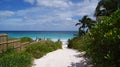 Path to the turquoise crystal clear water of a Caribbean beach