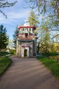 Path among the trees to the entrance to the Pavilion Chinese gazebo