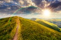 path uphill the mountain top at sunset Royalty Free Stock Photo