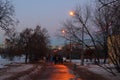 Path way with yellow lighting lanterns in Moscow Park Kolomenskoe Royalty Free Stock Photo