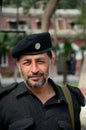 Pathan Pakistani policeman smiles for camera Peshawar Pakistan