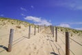 Pathway access french sea coast with sunny atlantic beach sea in summer day Royalty Free Stock Photo
