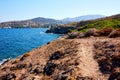 Pathway, cliffs sea and Gumusluk Bay