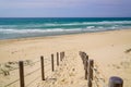 Pathway dune access to sand beach in La jenny Beach near Lege cap-ferret in France Royalty Free Stock Photo