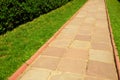 Pathway in Garden with concrete bumps. Royalty Free Stock Photo