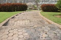 Pathway in garden, Stone walkway in the park with green grass Royalty Free Stock Photo