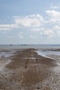 Pathway going out into the sea at Westlcliff, Essex, England, on a summer`s day Royalty Free Stock Photo