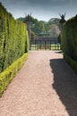 Pathway through the grounds of a formal garden