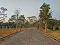 Pathway in the Indrokilo botanical garden, Boyolali, Indonesia. Stepping stones in the grass lawn, the way to success and mileston Royalty Free Stock Photo