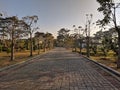 Pathway in the Indrokilo botanical garden, Boyolali, Indonesia. Stepping stones in the grass lawn, the way to success and mileston