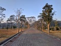 Pathway in the Indrokilo botanical garden, Boyolali, Indonesia. Stepping stones in the grass lawn, the way to success and mileston Royalty Free Stock Photo