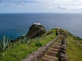 Pathway leading to the lighthouse surrounded by the sea in Azores, Santa Maria Island, Portugal