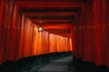 Pathway orii gates at Fushimi Inari Shrine at night and rain Kyoto, Japan Royalty Free Stock Photo