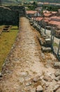 Pathway over stone wall with metal balustrade